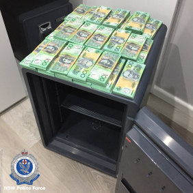Cash seized during raids on Assure Protection Services.