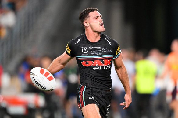 Nathan Cleary of the Panthers celebrates scoring a try.