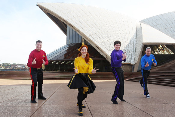 Yellow Wiggle Emma with Simon Pryce, Lachlan Gillespie and Anthony Field on the steps of the Sydney Opera House in June 2020.