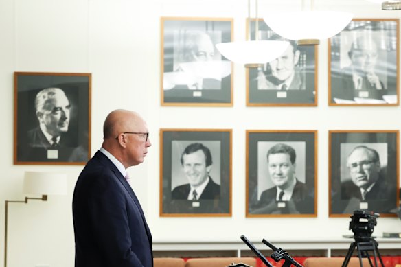 All the Liberals’ men: Peter Dutton in the Liberal party room with photos of past leaders, all of them men.