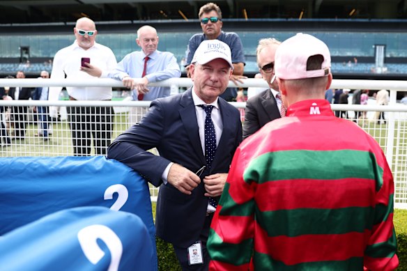 Kris Lees (left) saddles up Elegant Force to go against Divine Effort at Grafton on Tuesday.