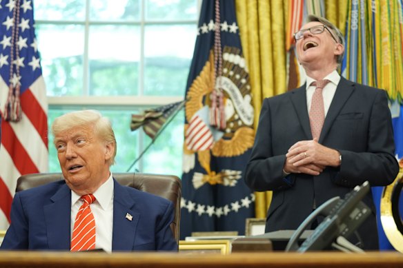 Britain’s ambassador to the US, Peter Mandelson (right), laughs at a comment by US President Donald Trump.