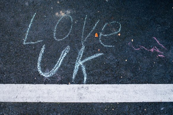 A chalk message outside the Lemon Hotel.