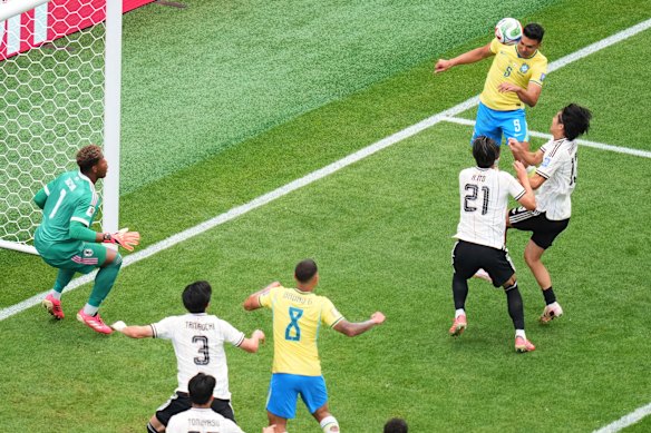 Brazil’s Casemiro scores his side’s first goal.