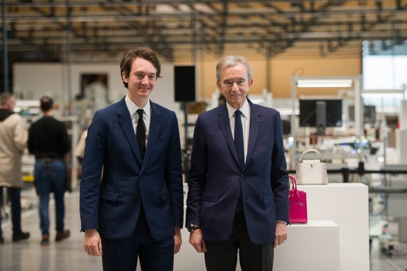 Bernard Arnault, billionaire and chairman of LVMH Moet Hennessy Louis Vuitton SE, right, and one of his five children, Frederic Arnault.
