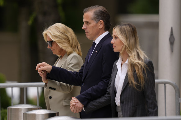 Hunter Biden, centre, President Joe Biden’s son, accompanied by his mother, first lady Jill Biden, left, and his wife, Melissa Cohen Biden, right, walking out of federal court after hearing the verdict, 
