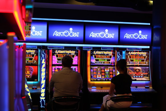 Questionable investment: Almost 40 per cent of Australian adults gamble at least once a week, a government survey found earlier this year - and the costs to society are huge.