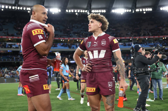 Maroons Felise Kaufusi and Reece Walsh cut dejected figures after the game two defeat.