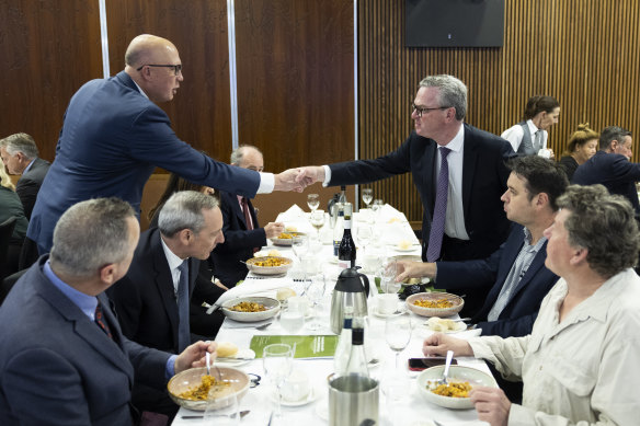 Opposition Leader Peter Dutton and former federal minister Christopher Pyne ahead of an address by Robert Nioa, Group CEO of NIOA, (seated second from left) at the National Press Club on Friday, December 1, 2023. 