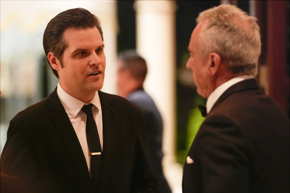 Matt Gaetz talks with Robert F. Kennedy Jr, before President-elect Donald Trump speaks during an America First Policy Institute gala at his Mar-a-Lago estate.