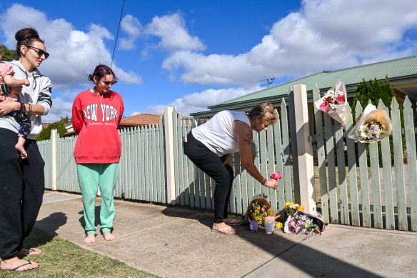 Cobram locals lay flowers outside Emma Bates’ home on Thursday.