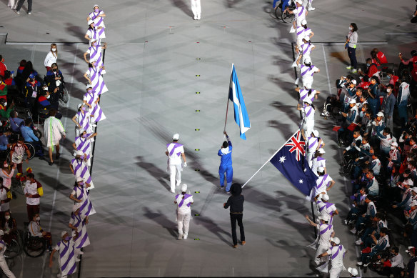 Ellie Cole enters the stadium during Sunday’s closing ceremony in Tokyo.