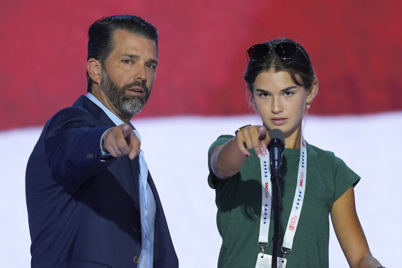 Donald Trump Jr. and his daughter Kai Trump on stage during the third day of the convention.