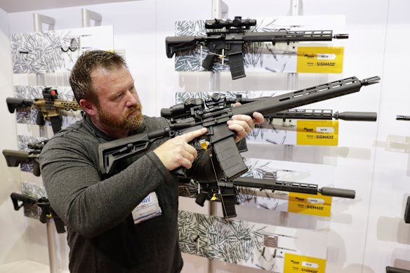 A Sig Sauer display of AR-15 rifles at an exhibition held by the US National Rifle Association in 2019.