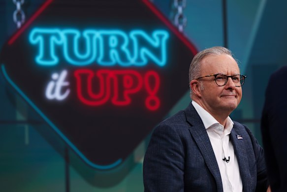 Turn it up, PM … Albanese on the Sunday Footy Show at the Nine studio in Sydney.
