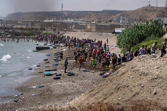 There were chaotic scenes on the Ceuta shoreline.