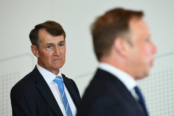 Premier Steven Miles took infrastructure advice from IOC Vice-President John Coates over that of former Brisbane lord mayor Graham Quirk (left) and his highly credentialled review team.