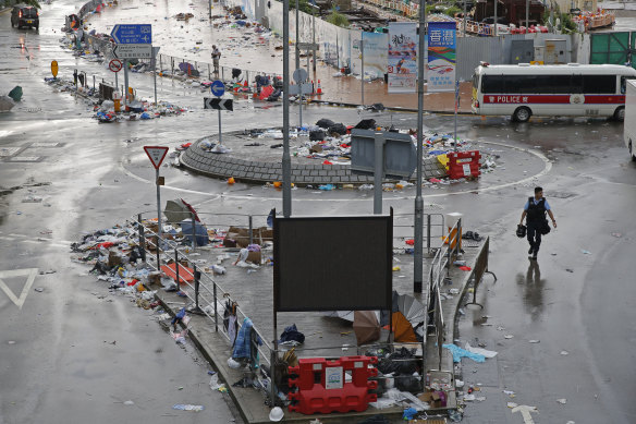 Traffic has been restored in the heart of Hong Kong a day after clashes between police and protesters.