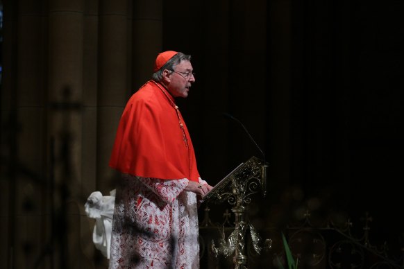 Cardinal George Pell, then archbishop of Sydney, leads a mass on the 10th anniversary of the September 11 terrorist attacks.