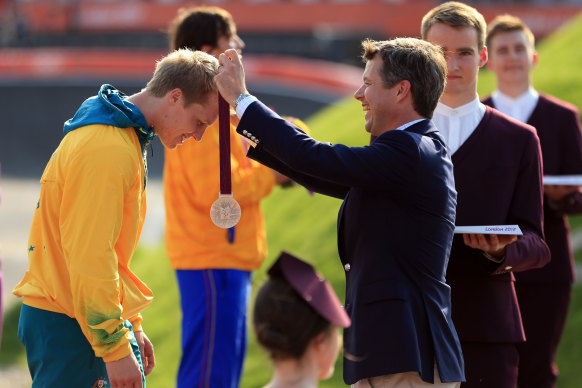 Sam Willoughby is presented with his silver medal in London.