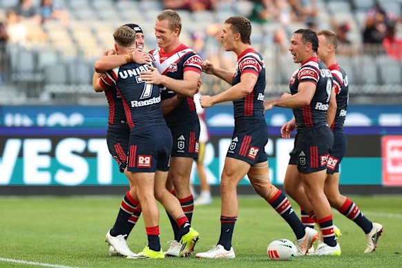 The Roosters celebrate a try for Victory Radley.