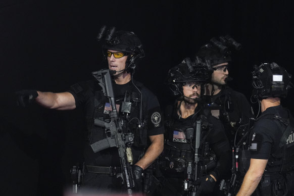 A Secret Service counter-assault team assembling on the third day of the convention.