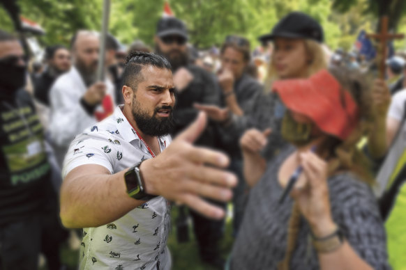 Avi Yemini at the Eureka Freedom 
Rally in Melbourne in 2021. “Avi’s an agitator, a provocateur,” says his brother, Manny Waks. “But I’m yet to be convinced that he believes a lot of what he does.”