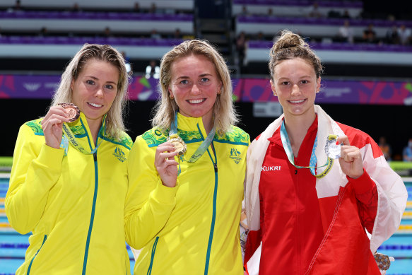 Australia’s Kiah Melverton (left) won bronze with rising Canadian star Summer McIntosh second.