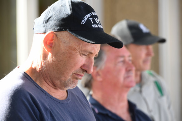 Outsourced Qantas workers stand outside the Federal Court which on Friday decided they would not be reinstated.