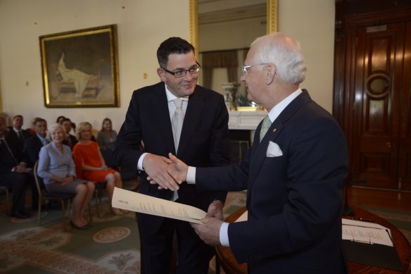 The beginning: Daniel Andrews is sworn in as premier by Victorian governor Alex Chernov on December 4, 2014.