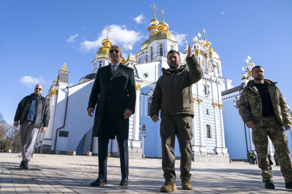 US President Joe Biden walks with Ukrainian President Volodymyr Zelensky at St Michael’s Cathedral during a surprise visit on February 20.