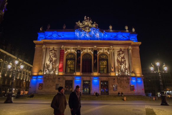 The city centre of French city Lille is lit in blue and yellow as an act of solidarity with Ukraine. 