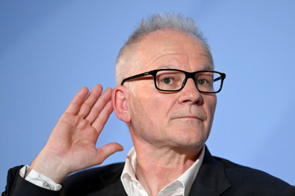 Cannes Film Festival director Thierry Fremaux gestures during the 74th Cannes Film Festival official selection presentation.