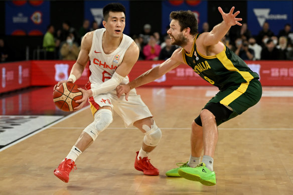 Matthew Dellavedova, right, will do everything he can to make the Boomers team for the FIBA World Cup in August.