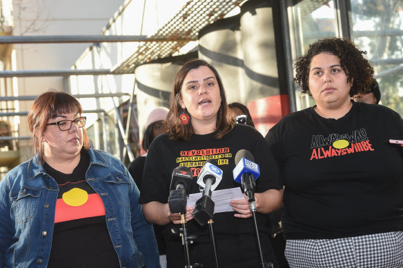 Meriki Onus (centre) from the Warriors of Aboriginal Resistance speaks on Friday.