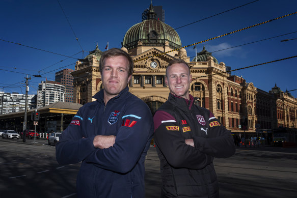 NSW captain Jake Trbojevic and Queensland skipper Daly Cherry-Evans outside Melbourne’s Flinders Street Station.