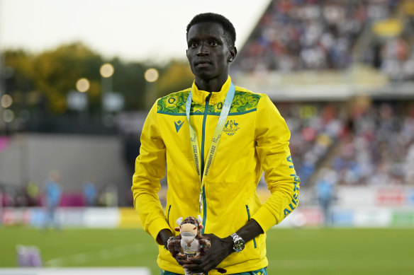 Bol on the podium after winning silver in the 800m at the Commonwealth Games.