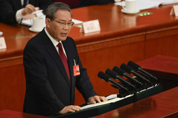 Premier Li Qiang speaks during the opening session of the National People’s Congress (NPC) at the Great Hall of the People in Beijing.