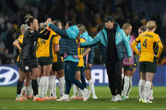 Matildas’ coach Tony Gustavsson congratulates players after the game.