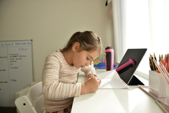 Five-year old Evie Macheda starts remote learning at home.