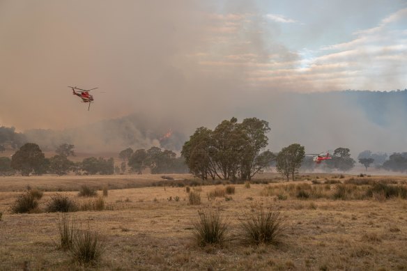 A helicopter battles the Bayindeen fire earlier this week.