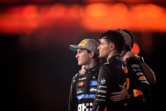 Oscar Piastri, Max Verstappen (hidden) and Lando Norris after last year's F1 season finale.