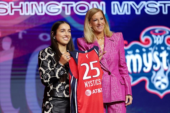 Georgia Amoore with WNBA commissioner Cathy Engelbert after being selected with the sixth pick at the draft..
