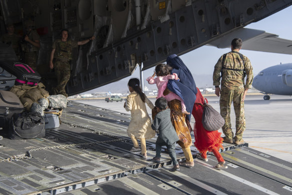 A US Air Force plane evacuates Afghans. 