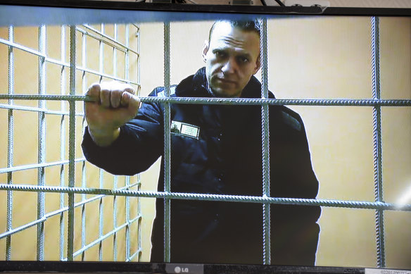Russian opposition leader Alexei Navalny speaks from prison via a video link, during a court session in Petushki, Vladimir region, east of Moscow, Russia, in January. He sued the prison colony for classifying him as posing a potential extremist or terrorist threat. 