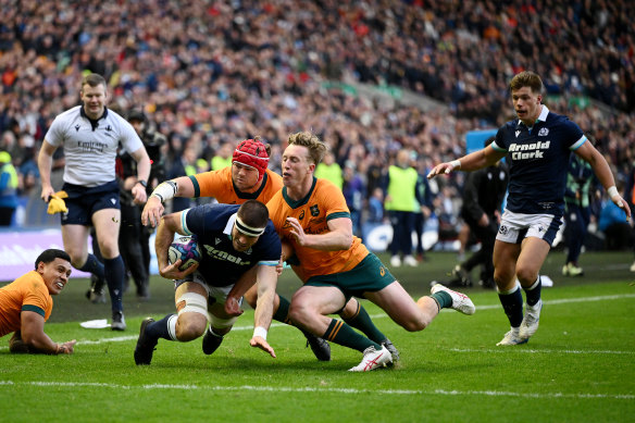 Josh Bayliss of Scotland scores his team’s third try.