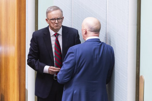 Prime Minister Anthony Albanese in discussion with Opposition Leader Peter Dutton during Question Time at Parliament House in Canberra.