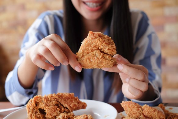 It’s oddly gratifying to see someone eat fried chicken.