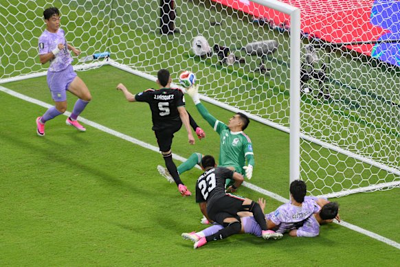 Raul Rangel makes a crucial save in the final minutes of Mexico’s match against South Korea.
