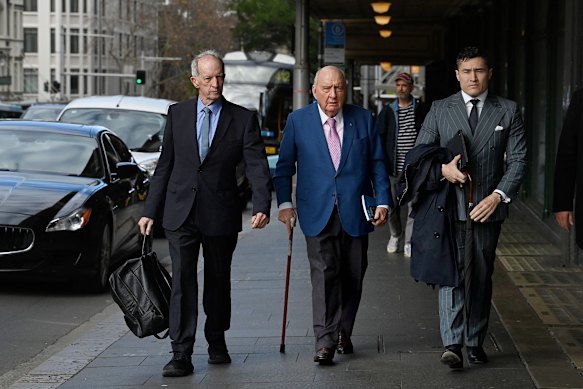 Alan Jones arrives at the Downing Centre Local Court on Wednesday.